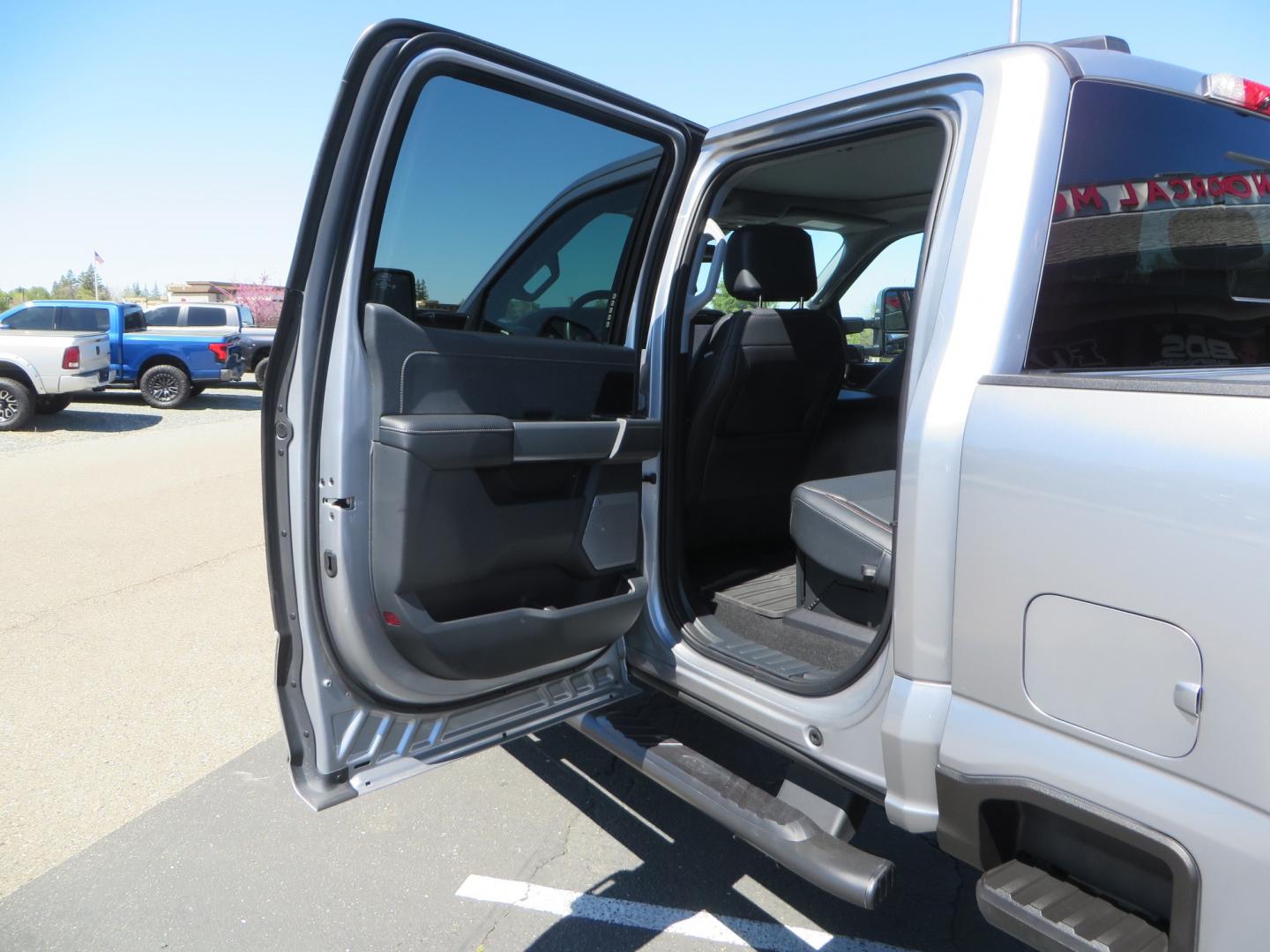 2023 SILVER /BLACK Ford F-350 SD Lariat Crew Cab 4WD (1FT8W3BT2PE) with an 6.7L V8 DIESEL engine, 10 speed automatic transmission, located at 2630 Grass Valley Highway, Auburn, CA, 95603, (530) 508-5100, 38.937893, -121.095482 - Features a BDS 5" radius arm suspension system, Fox Shocks, 37" Nitto Ridge Grappler tires, 20" Fuel Clash wheels, and Camper tie downs. - Photo#43